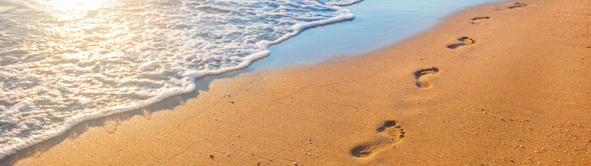 Podologische Praxis Gut zu Fuß, Podologin, Anja Müller - Fussspuren im Sand